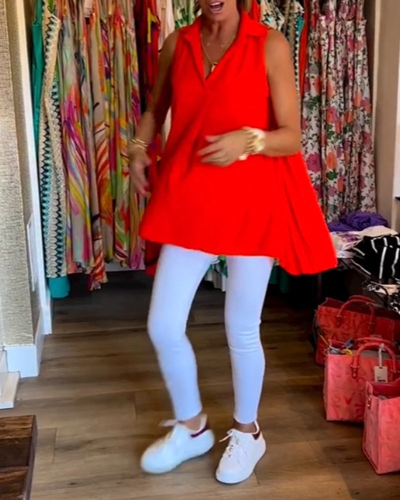 Mouwloze top met ruches en revers