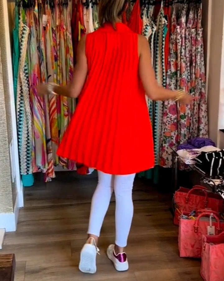 Mouwloze top met ruches en revers