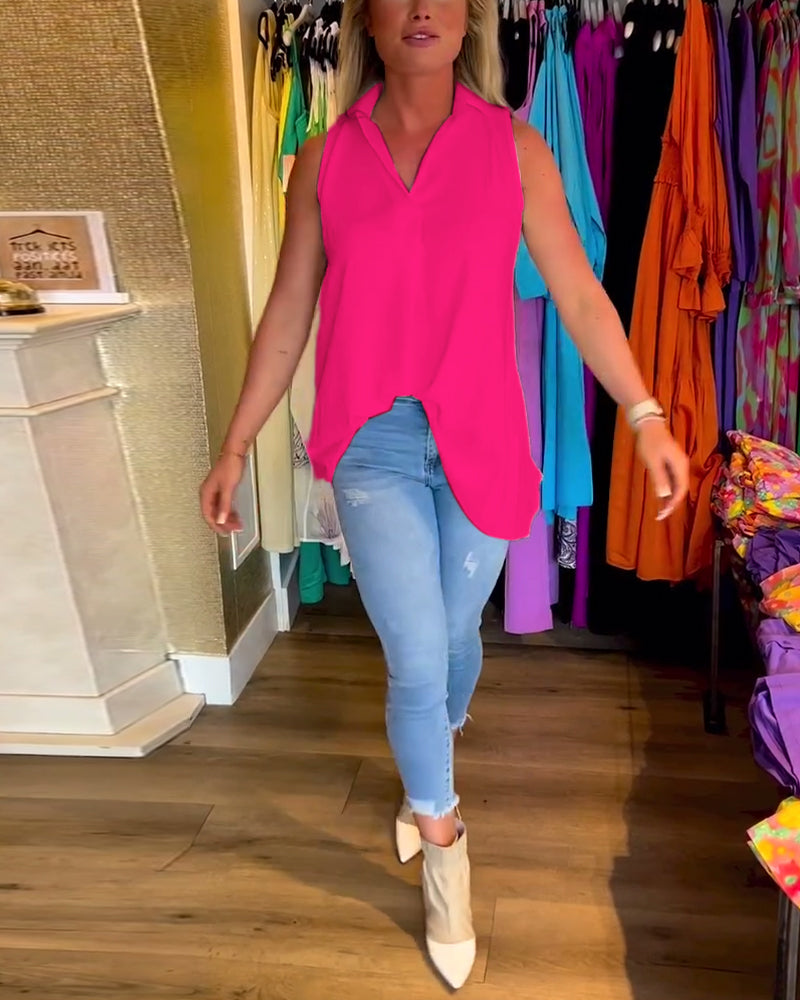 Mouwloze top met ruches en revers