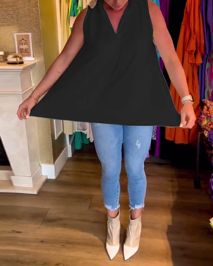 Mouwloze top met ruches en revers