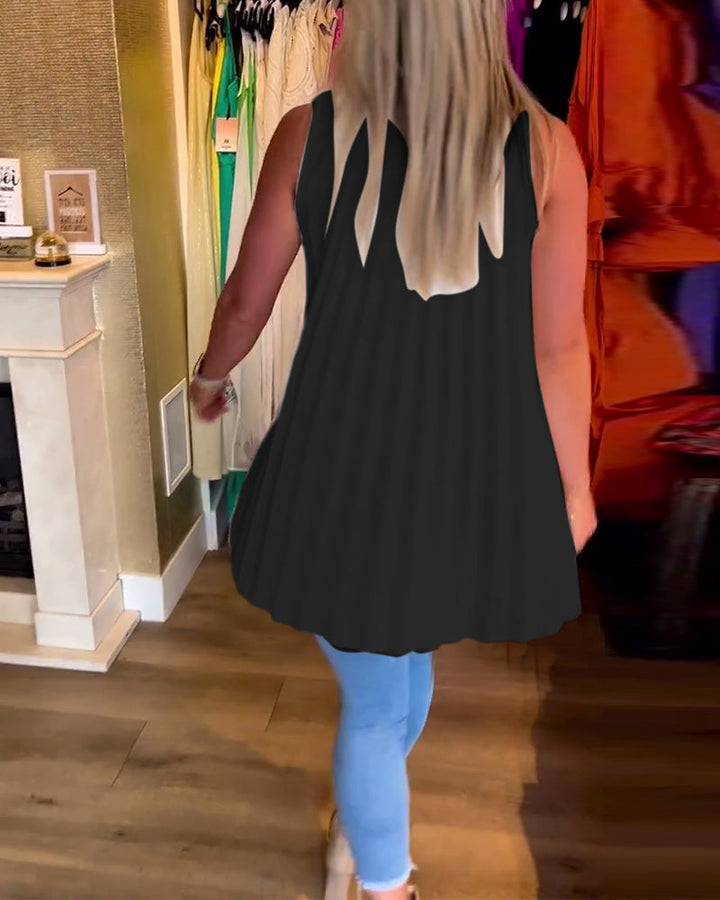 Mouwloze top met ruches en revers