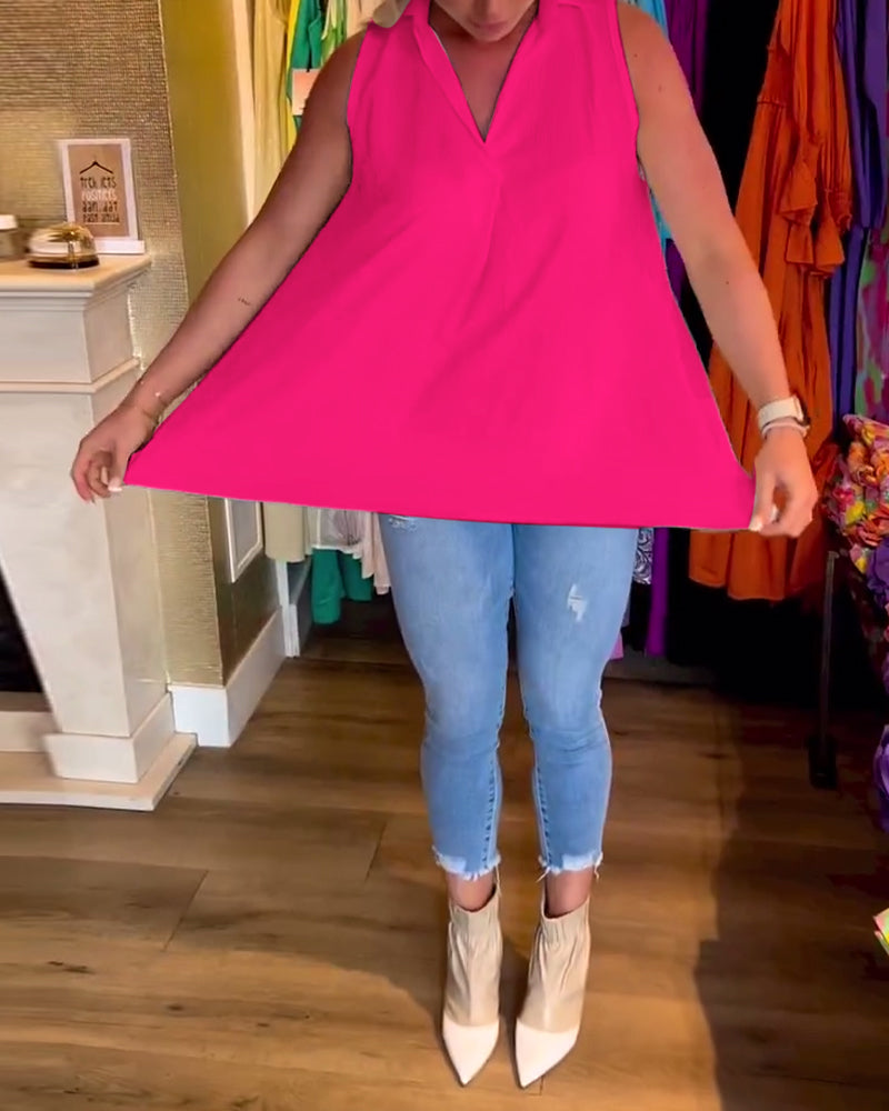 Mouwloze top met ruches en revers