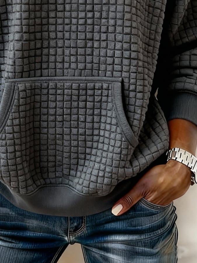 Casual, geruit gebreid sweatshirt voor dames met off-shoulder halslijn en structuurpatroon.