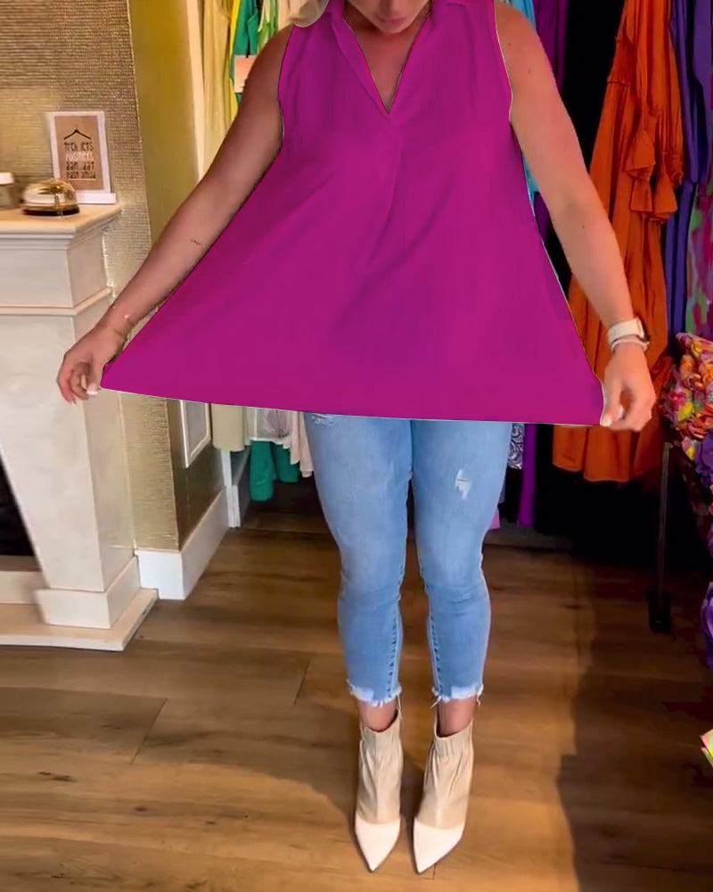 Mouwloze top met ruches en revers