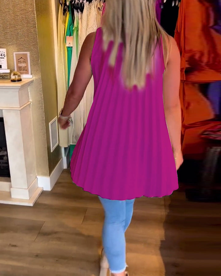 Mouwloze top met ruches en revers