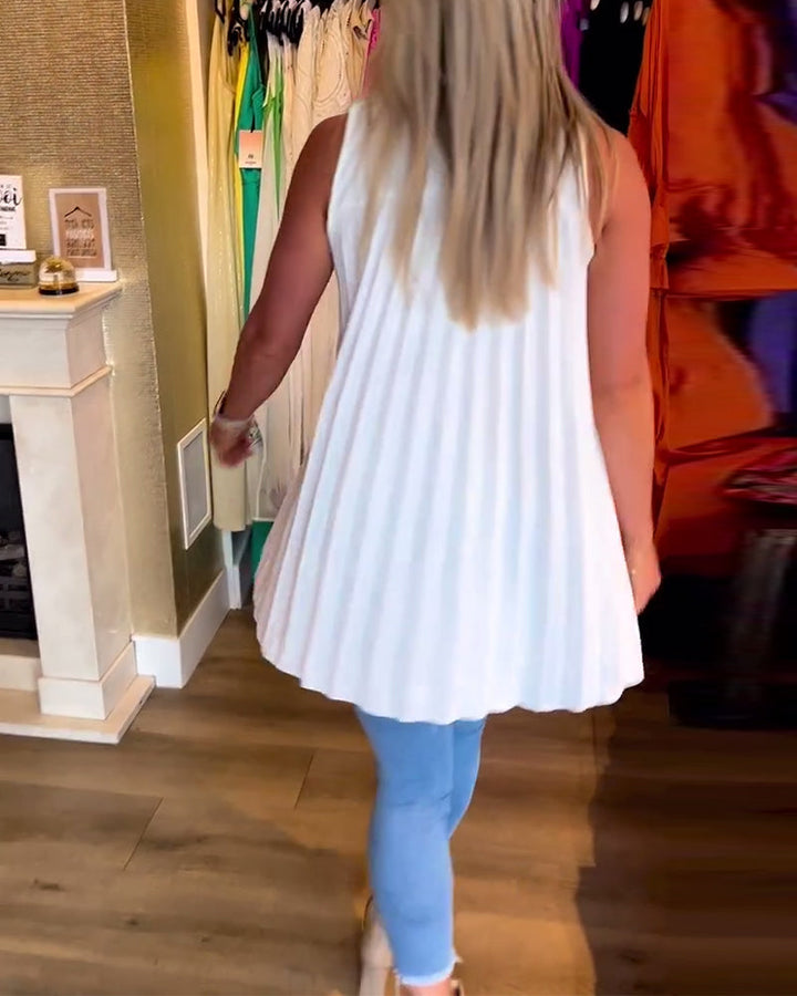 Mouwloze top met ruches en revers